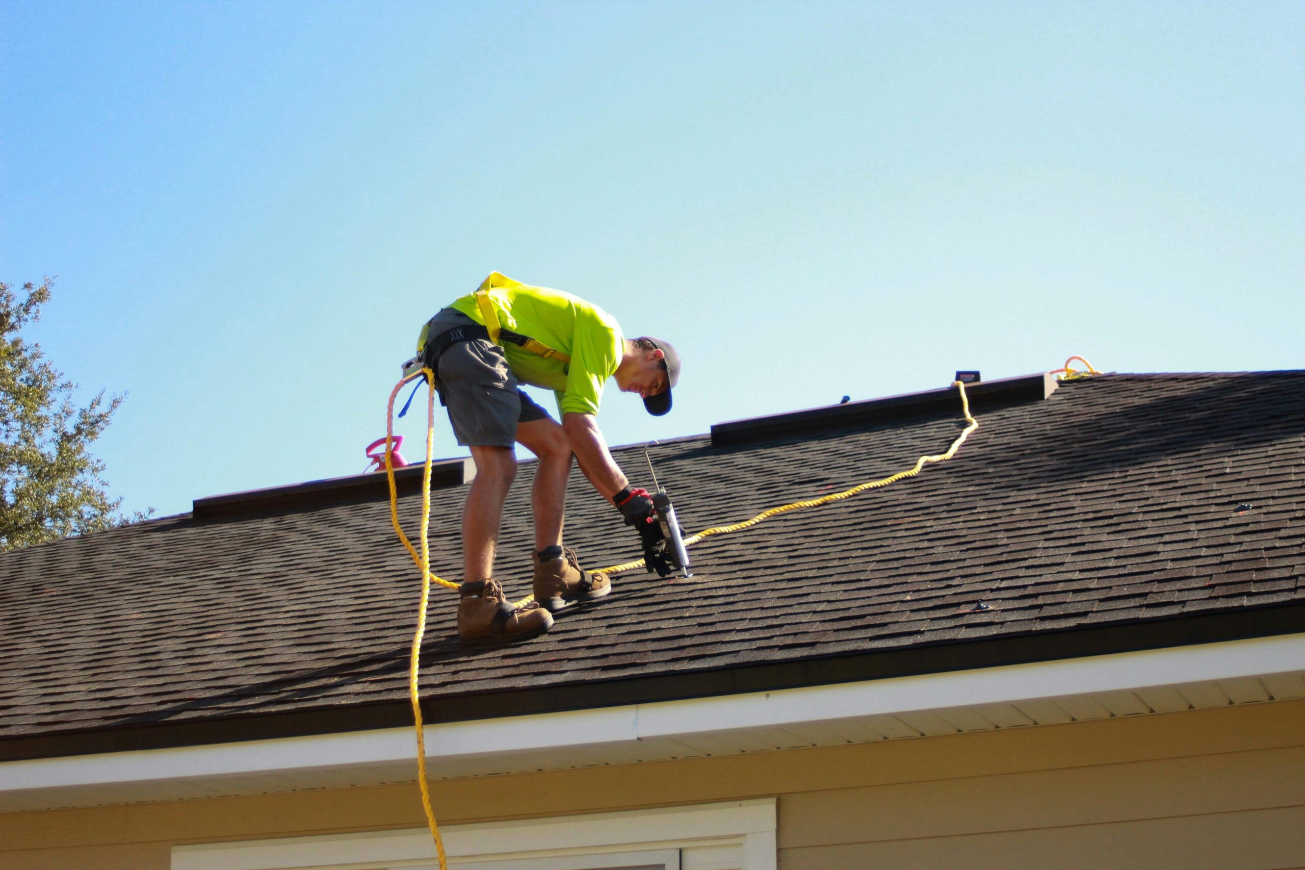 roofing contractor doing work on a roof